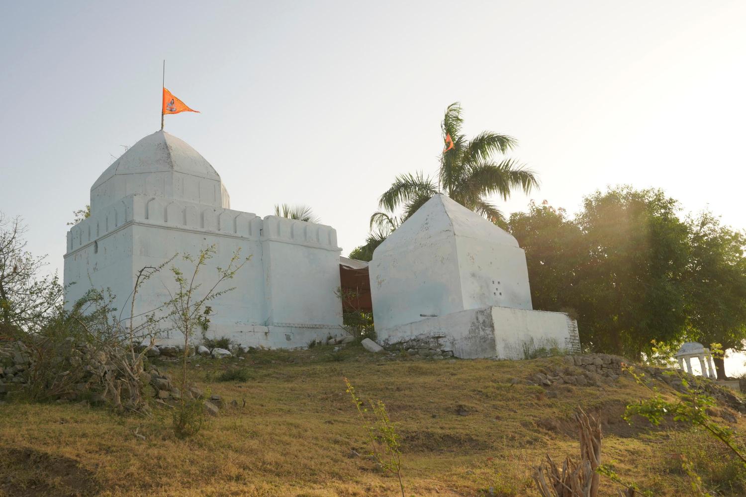 Nandikeshwar Mahadev temple and Badkeshwar Mahadev temple in village Gangli get surrounded by the Sardar Sarovar dam waters and remain unapproachable except by boat till the reservoir waters recede, Photo credit_ Rohit Jain for Oral History Narmada