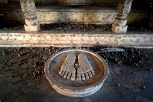 Resurfaced Charan Paduka in a Jain Derasar_ temple submerged in the Sardar Sarovar Dam waters in village Nisarpur, Madhya Pradesh, Photo Credit_ Rohit Jain for Oral History Narmada