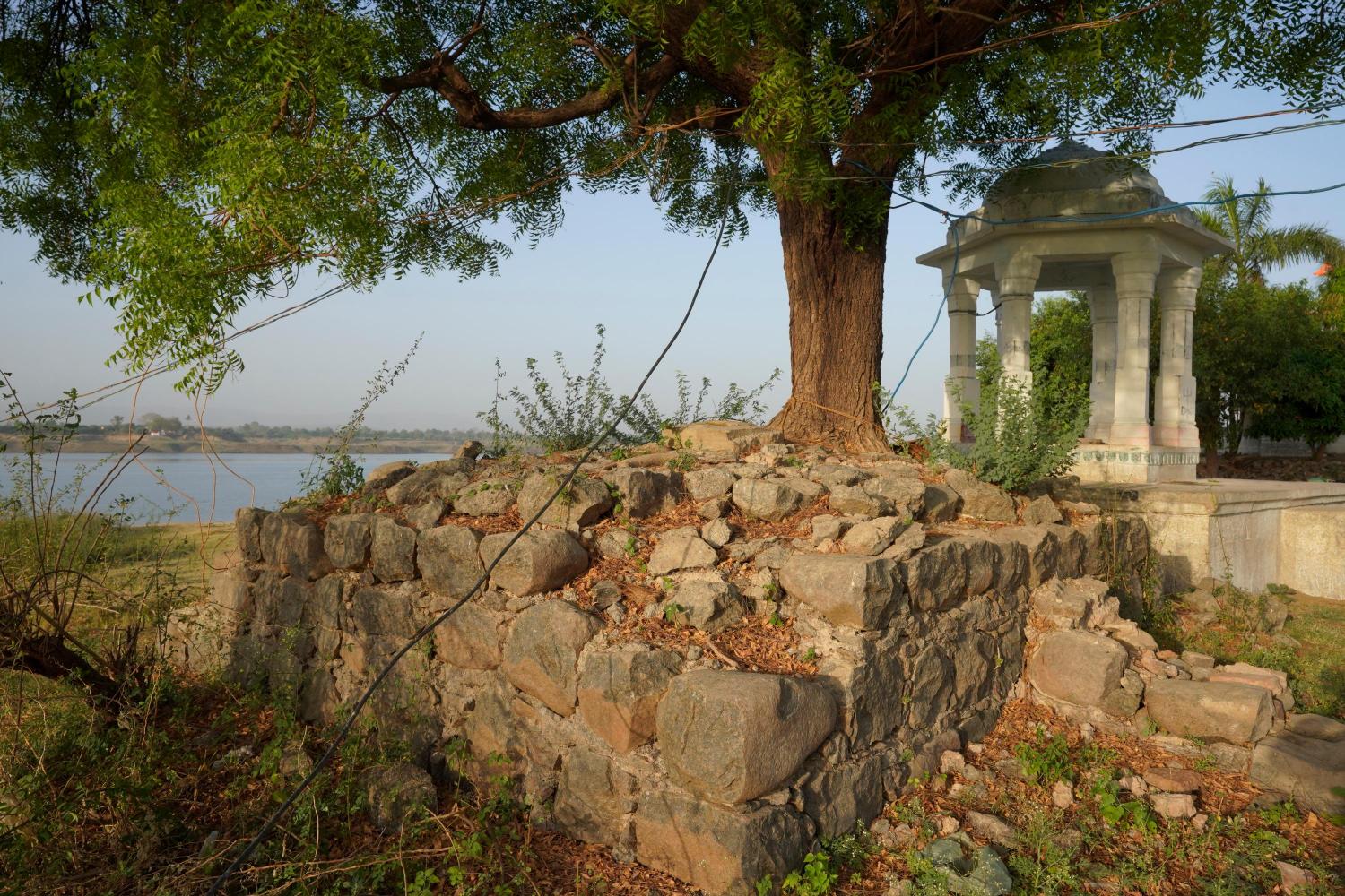 Samadhi of an ascetic_ holy person submerges in the Sardar Sarovar Dam waters in the village Gangli, Madhya Pradesh, and resurfaces when the dam waters recede, Photo credit_ Rohit Jain for Oral History Narmada (1)