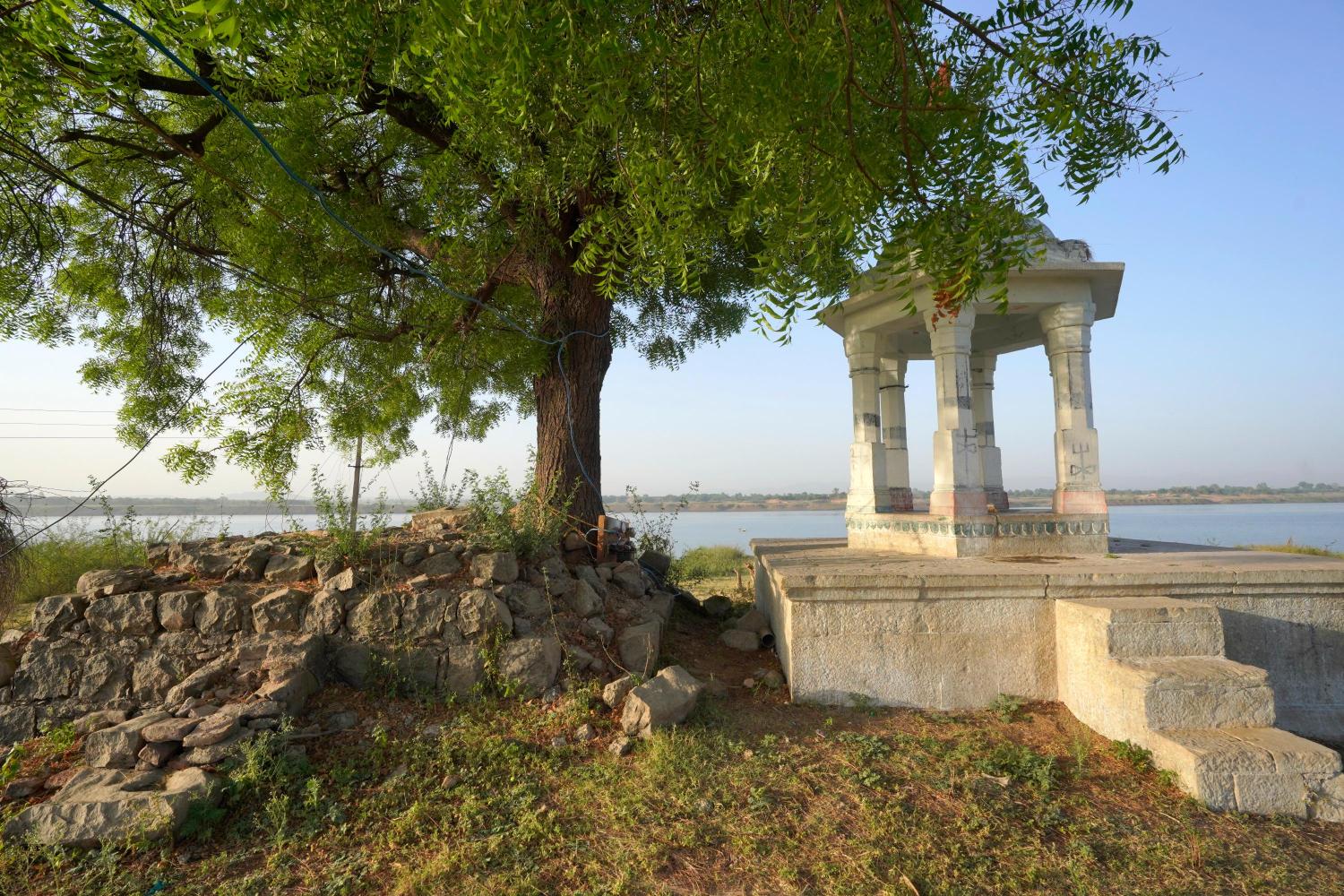 Shiv temple and a Samadhi of a holy person in village Gangli that submerges in the Sardar Sarovar Dam waters and resurfaces when the dam waters recede, Photo credit_ Rohit Jain for Oral History Narmada